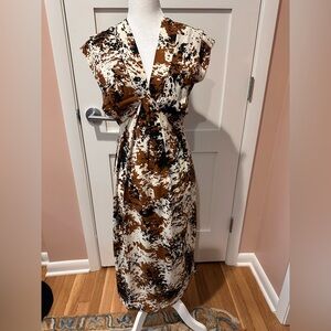 Steve Madden Size XS cow print v-neck dress.  Side slits, hidden side zip.